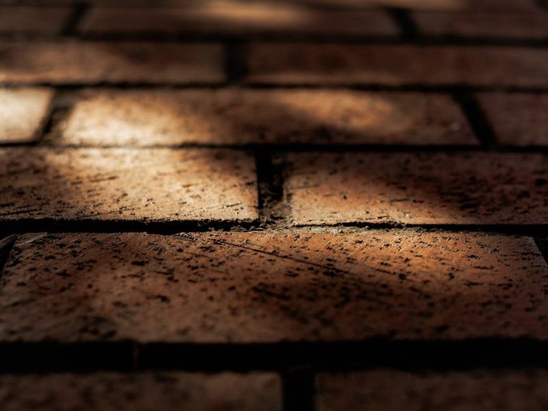 Detailed view of yoga equipment and floor texture.